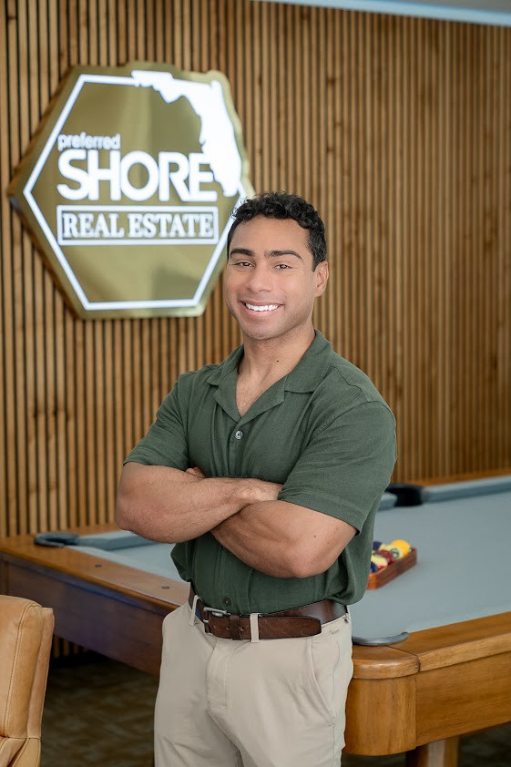 John Andrew Candelario at the Preferred SHORE Real Estate office